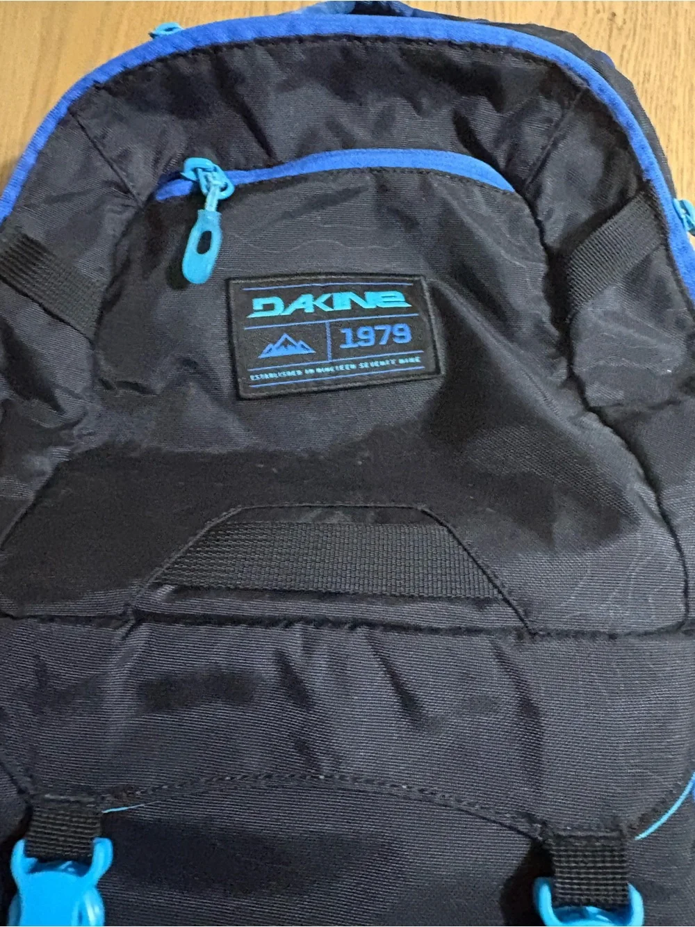 Dakine Black Backpack with Bright Blue Accents